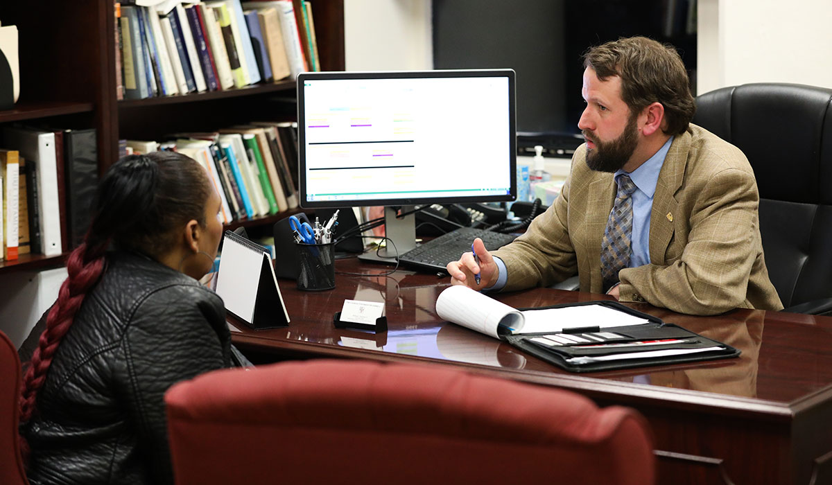 Associate's Admission Student and professor